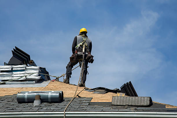 Professional Roof Replacement technician working in Somerset, MA